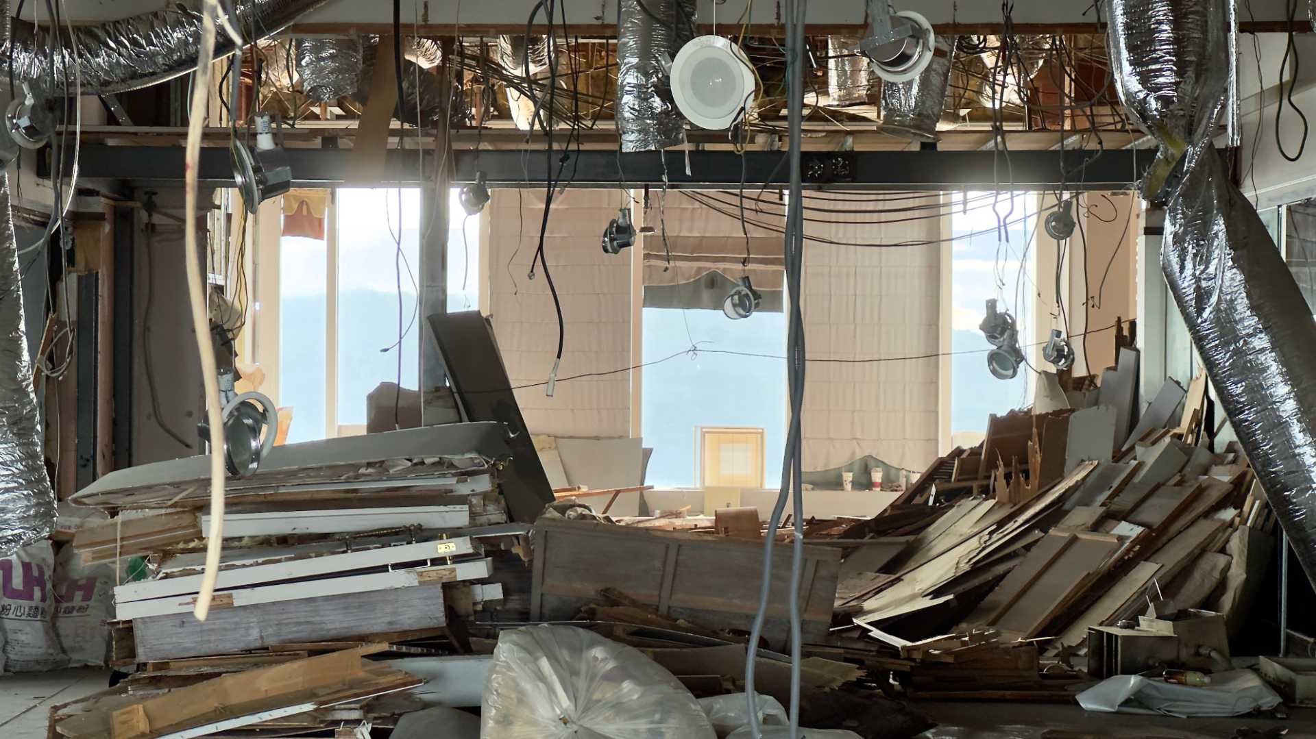 Interior of an office building in a state of demolition.