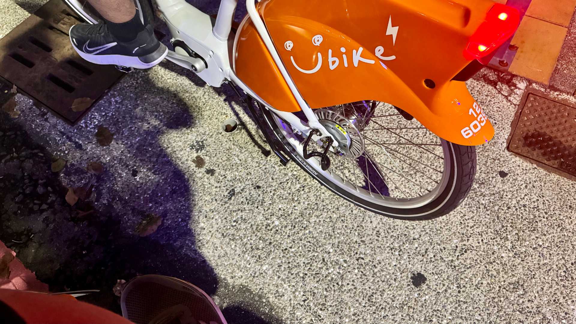 Two electric bicycles with YouBike branding.