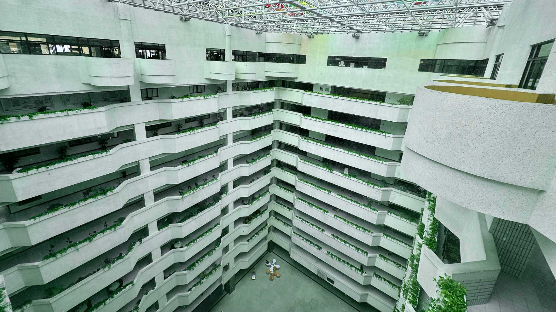 View of the 11-story atrium of the Kaohsiung City Government Building, taken from the upper level.