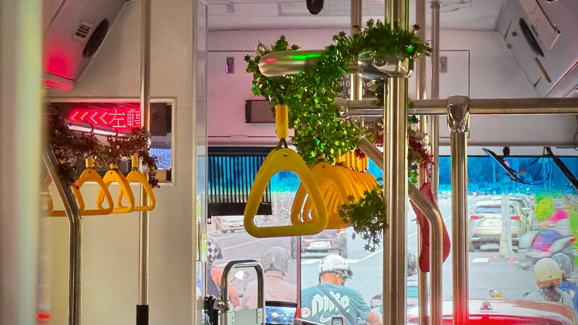 Christmas decorations inside a bus.