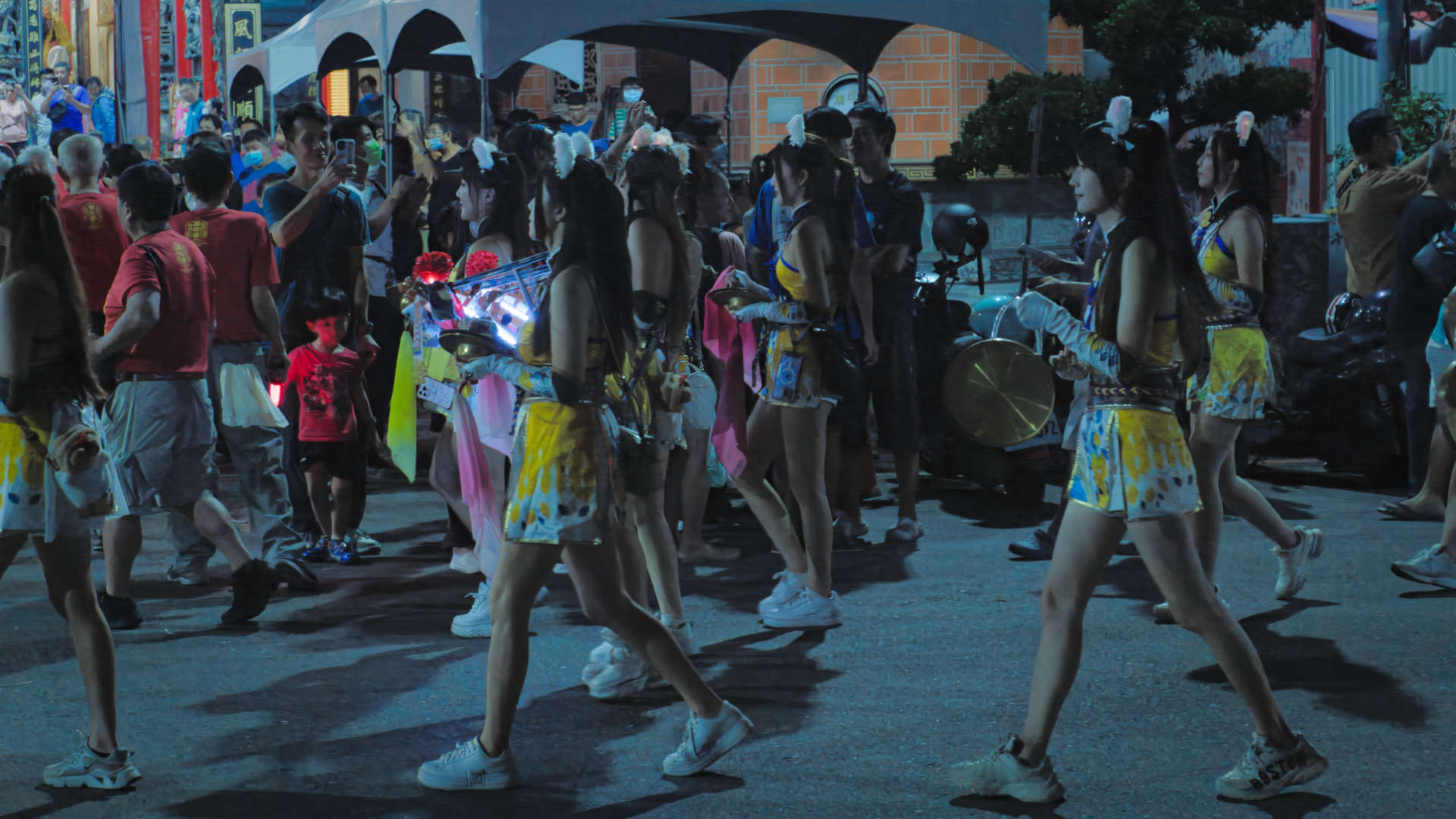 Taiwanese marching girls in a temple parade during the 2024 Kaohsiung Zuoying Wan Nian Festival.