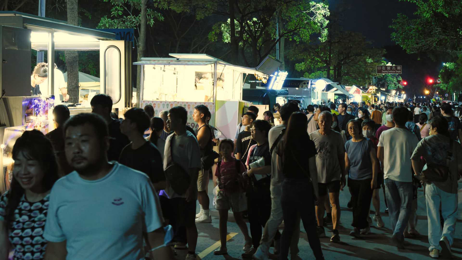 A moderately-crowded night market at the 2024 Kaohsiung Zuoying 10,000 Years Festival.