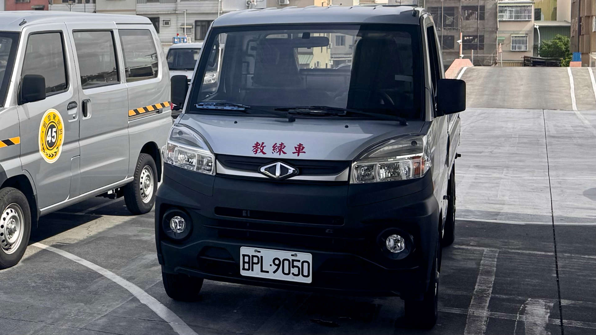 A brand-new-looking CMC Super Veryca pickup truck parked at a driving school in Kaoshiung, Taiwan.