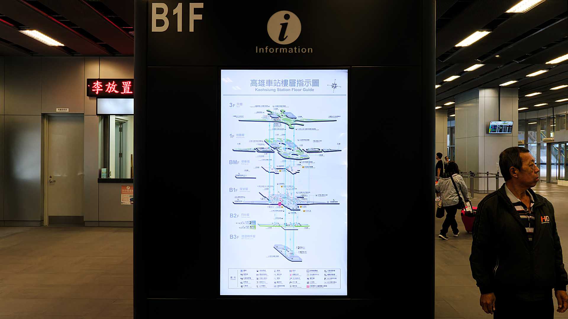 An illuminated floor plan of Kaohsiung Main Station, on an information booth panel.