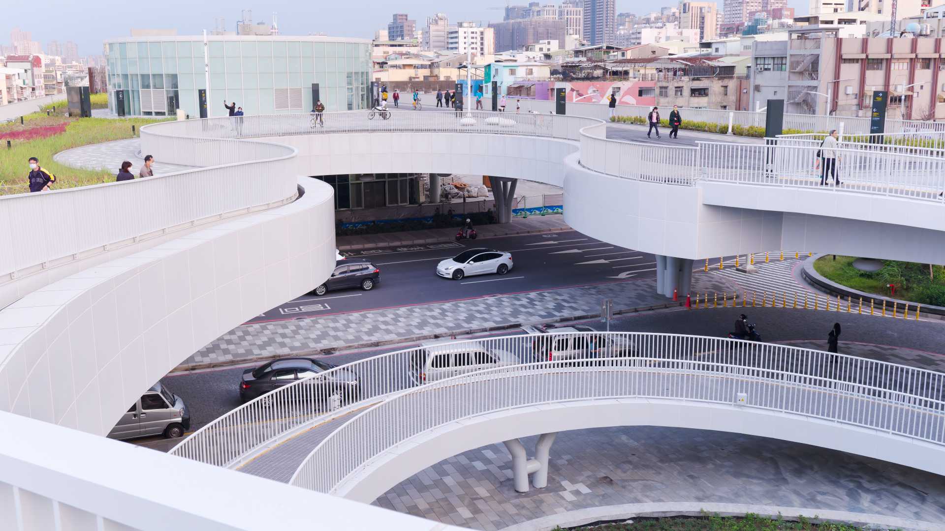 Multiple curved layers of outdoor spaces at Kaohsiung Station.