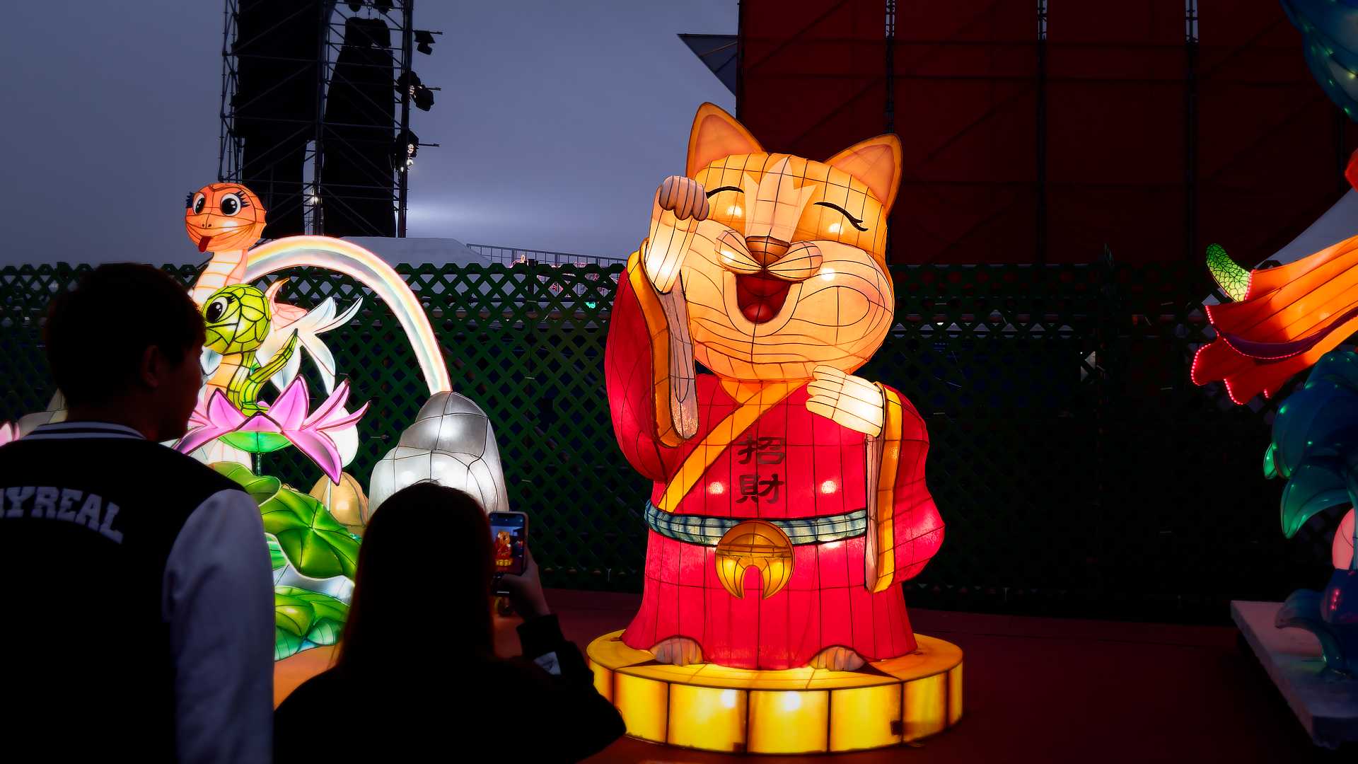 Lantern in the shape of a friendly beckoning cat.