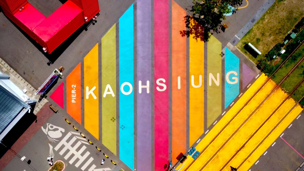 Top-down drone shot of the Kaohsiung Rainbow Crossing at Pier-2 Art Center, Taiwan.